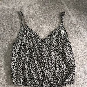 Black tank top with white flowers, size S